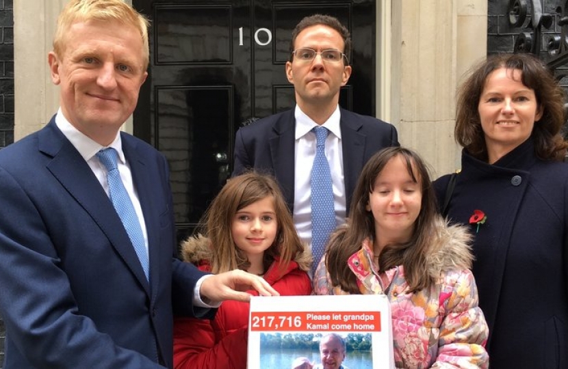 Oliver Dowden MP with the Foroughi family handing petition into No.10 Downing Street