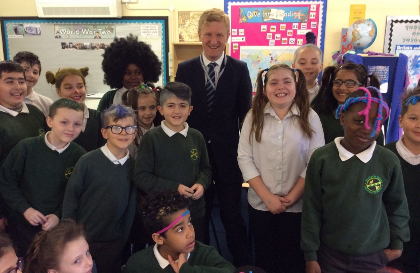Oliver Dowden MP with pupils from Saffron Green Primary School