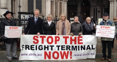 Oliver Dowden MP with anti-rail freight campaigners outside the High Court