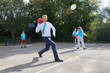 Mr Dowden with pupils at Sacred Heart Primary School playing dodgeball.jpeg